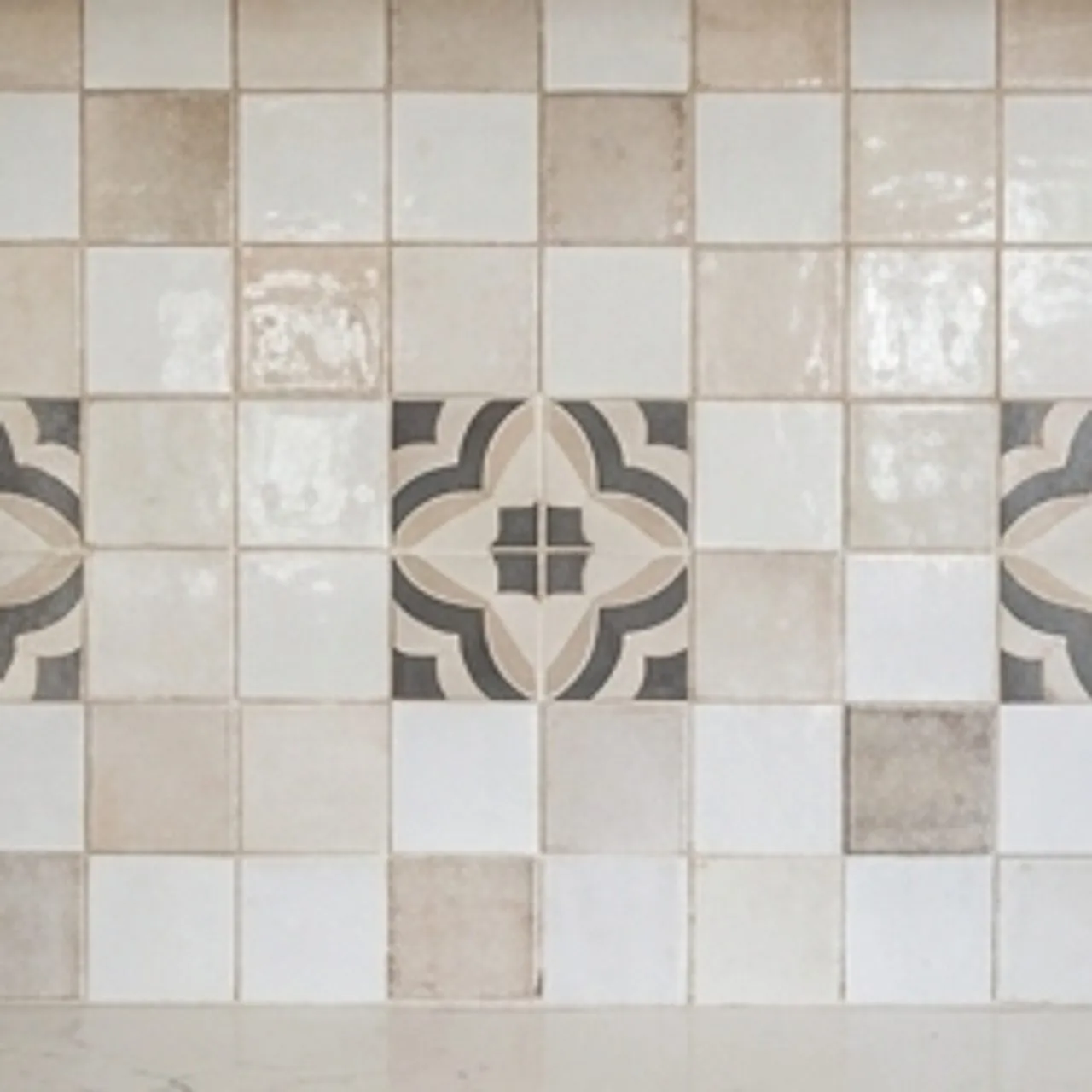 closeup of backsplash tiles with brand colors